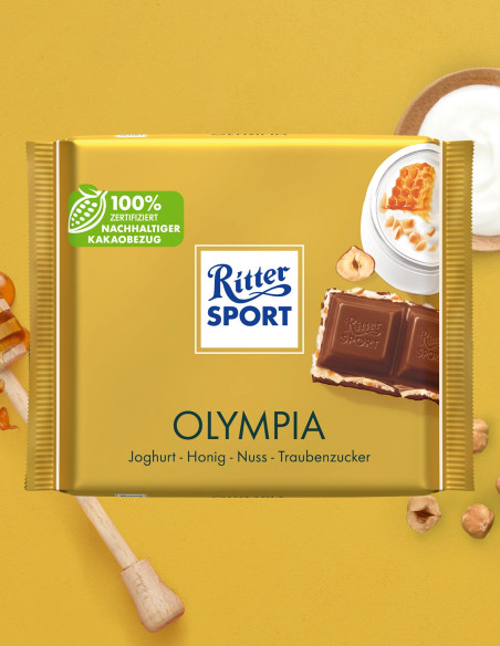 Ritter Sport Olympia - Молочний шоколад з йогуртом, медом та лісовими горіхами, 100 г
